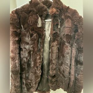 JACQUES SAINT LAURENT
FOR FC.I.
PARIS
NEW YORK
Brown fur jacket